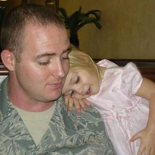 US Air Force Veteran Zach B. and his daugther.