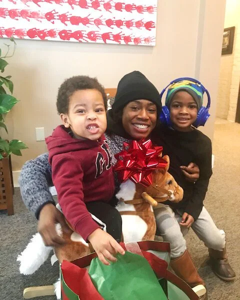 US Army Veteran Chyna W. with her kids.