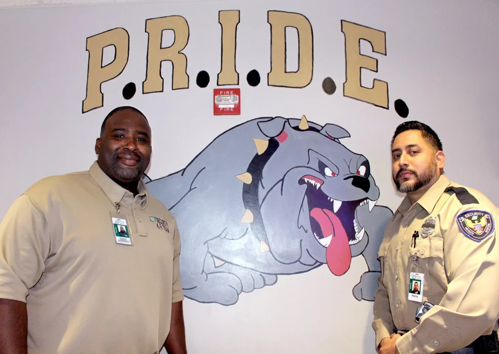 Calvin Ousby Jr. (K-9 Supervisor/Investigations) & Officer Heinz Scheffler (Marine) at the P.R.I.D.E. Academy.
