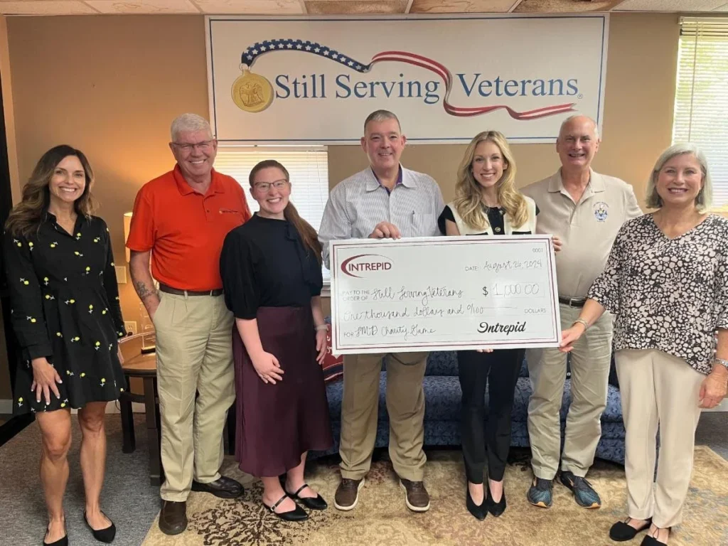 Intrepid introduces a new charity giveback Plinko game at their booth highlighting Still Serving Veterans at this year's SMD Symposium.