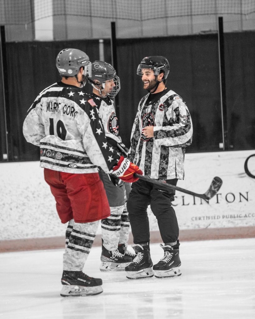 Team players during the Battle of the Brave hockey charity event.
